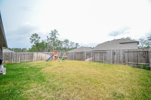 view of yard featuring a playground