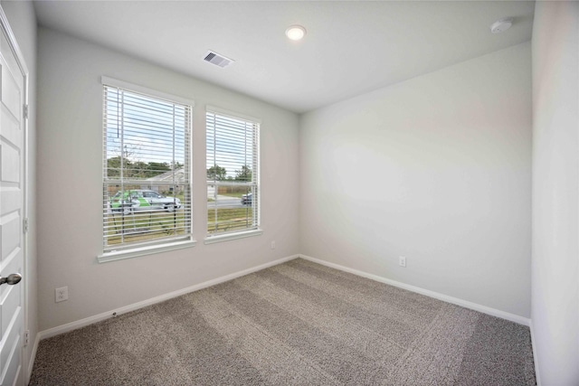 view of carpeted spare room