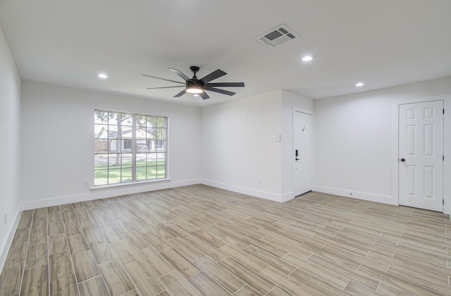 spare room with ceiling fan