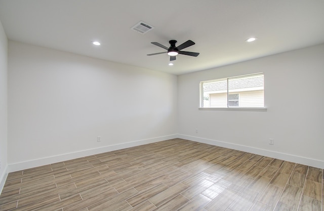 unfurnished room with ceiling fan