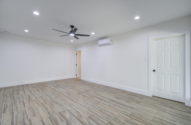 empty room with a wall mounted AC and ceiling fan