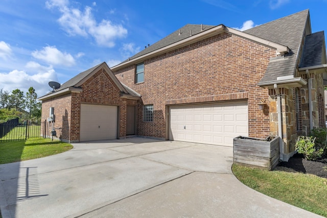 view of home's exterior with a garage