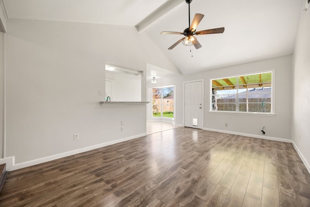 unfurnished living room featuring lofted ceiling with beams, ceiling fan, and dark wood-type flooring