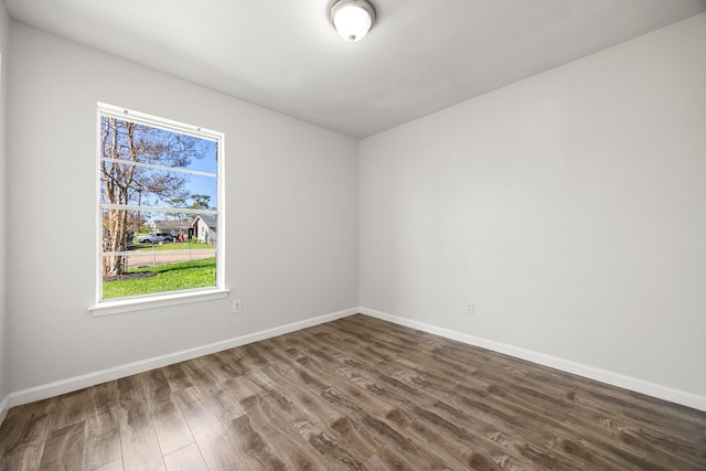 empty room featuring hardwood / wood-style flooring