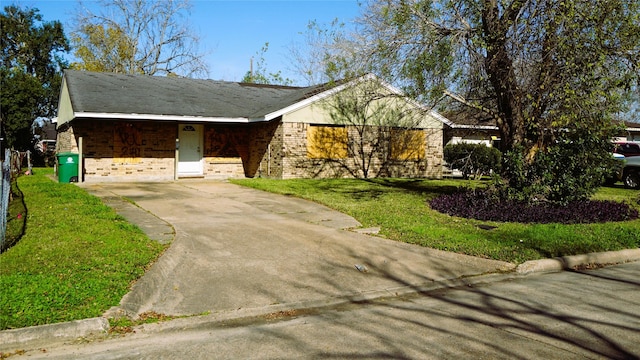 ranch-style house with a front yard