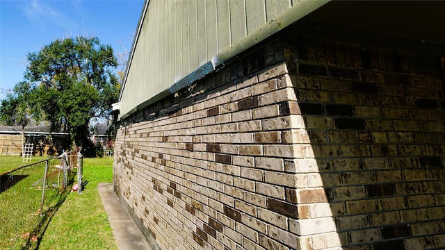 view of home's exterior with a lawn