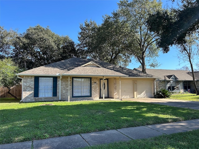 ranch-style house with a front yard and a garage