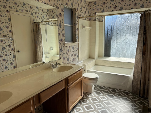 full bathroom with shower / bath combo, vanity, and toilet