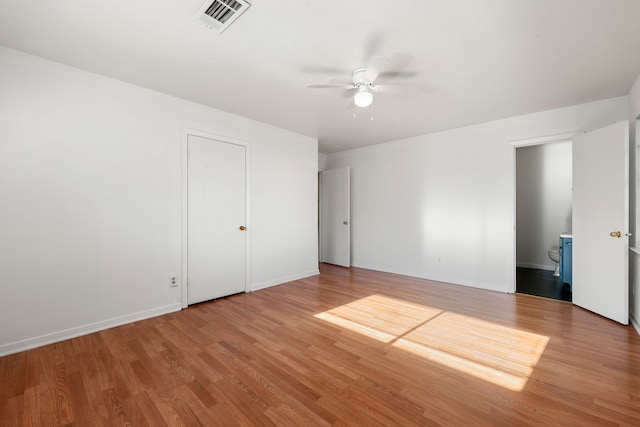 unfurnished bedroom featuring ceiling fan and hardwood / wood-style floors