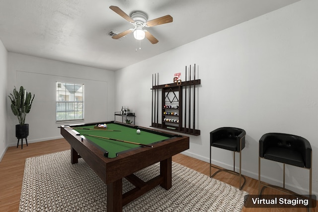 recreation room featuring ceiling fan, light wood-type flooring, and billiards