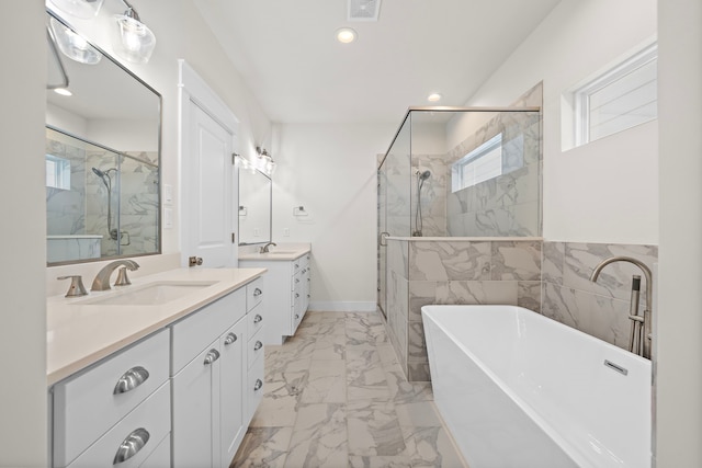 bathroom featuring vanity, tile walls, and independent shower and bath