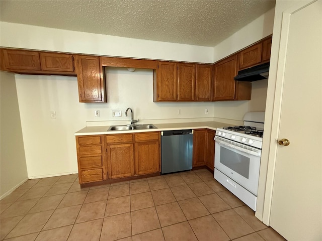 kitchen featuring sink, stainless steel dishwasher, a textured ceiling, light tile patterned floors, and white gas range oven