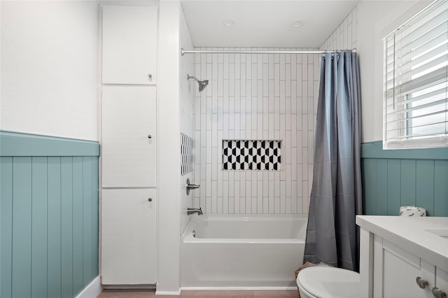 full bathroom featuring vanity, toilet, and shower / bathtub combination with curtain