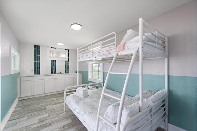 bedroom featuring light wood-type flooring