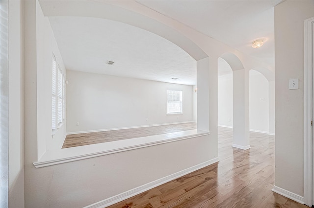 hall featuring wood-type flooring