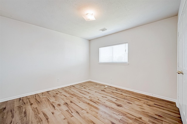 empty room featuring light hardwood / wood-style flooring