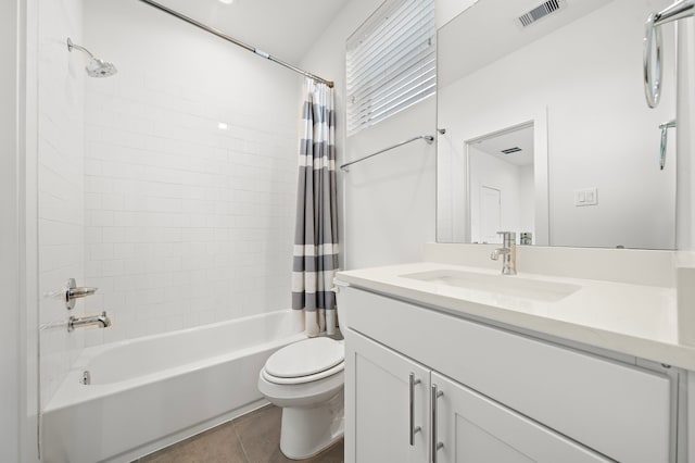 full bathroom with tile patterned flooring, vanity, shower / bath combination with curtain, and toilet