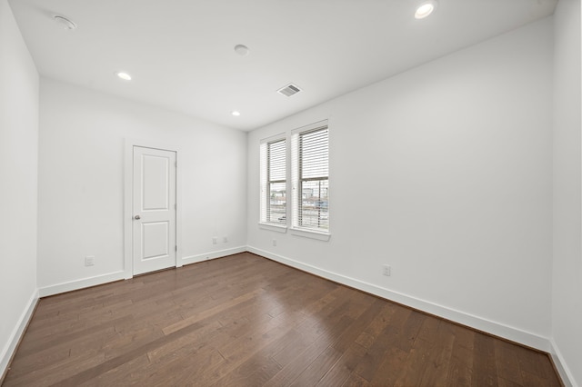 empty room featuring hardwood / wood-style floors