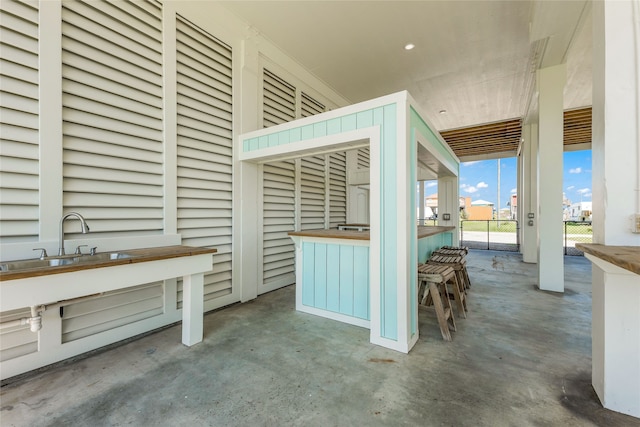 view of patio / terrace with a wet bar