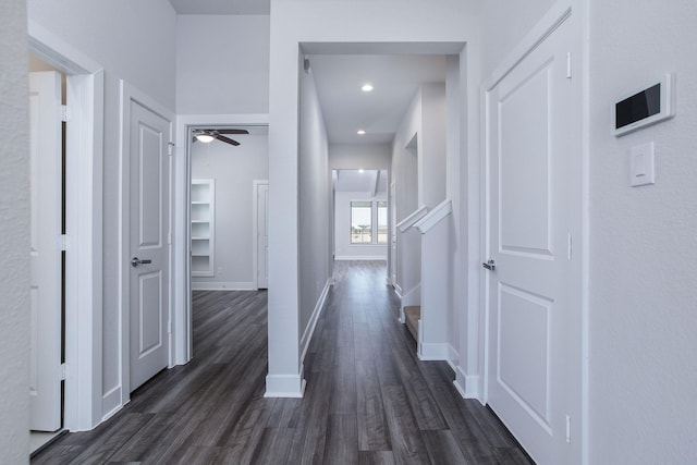 hall featuring dark wood-type flooring