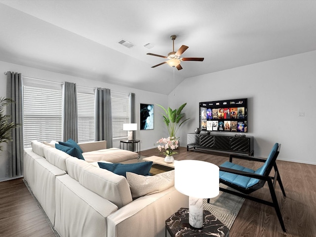 living room featuring wood-type flooring, vaulted ceiling, and ceiling fan