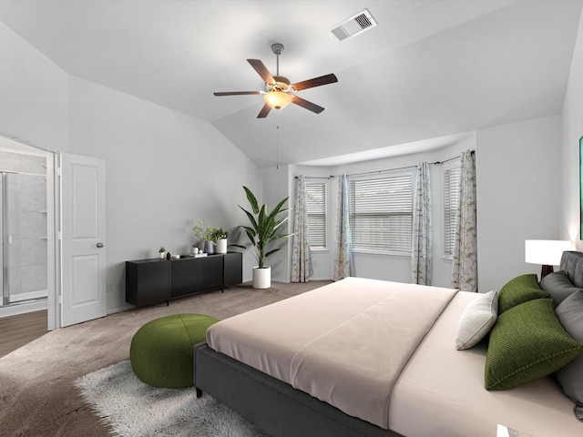 bedroom with carpet flooring, ceiling fan, and lofted ceiling