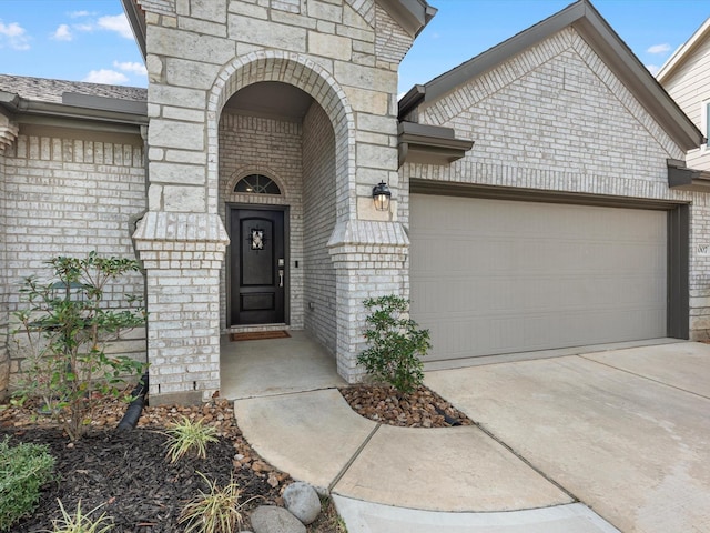 entrance to property with a garage