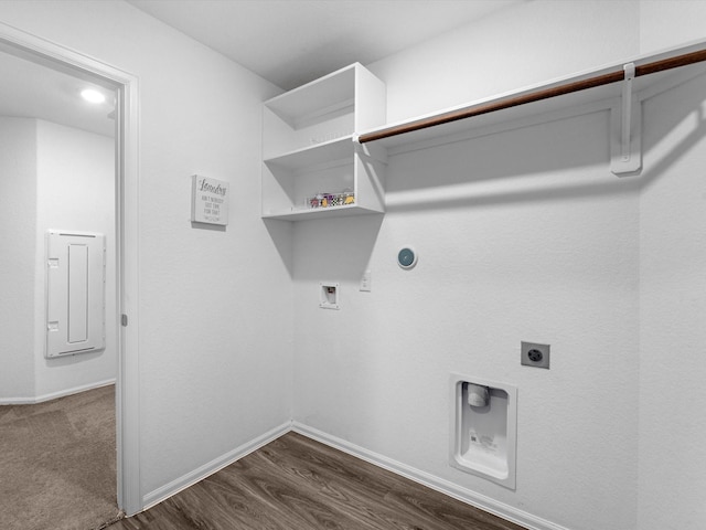 laundry area featuring electric dryer hookup, hookup for a gas dryer, dark hardwood / wood-style flooring, and washer hookup