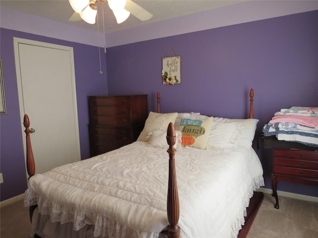 bedroom featuring ceiling fan and carpet floors