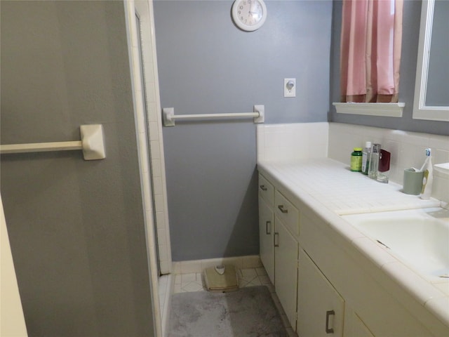 bathroom featuring vanity and tile patterned floors