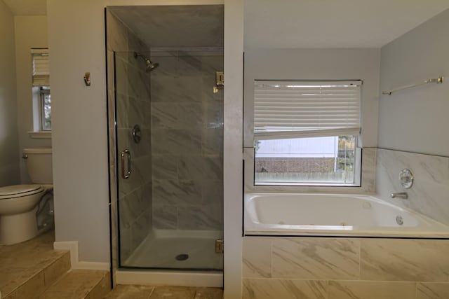 bathroom with tile patterned flooring, shower with separate bathtub, and toilet