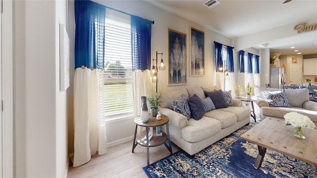 living room with a healthy amount of sunlight