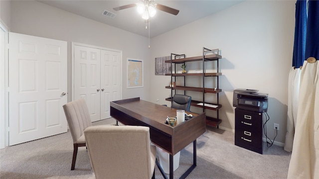 office area featuring ceiling fan and light carpet