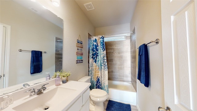 full bathroom with shower / bath combo, vanity, and toilet