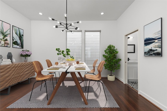 dining area with a chandelier and dark hardwood / wood-style floors