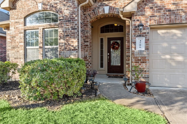 property entrance with a garage