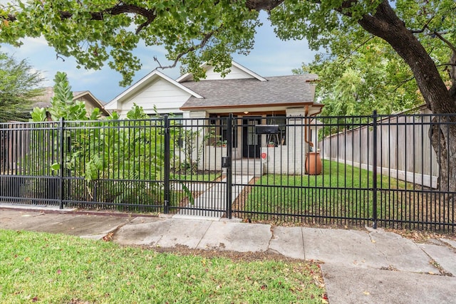 view of gate featuring a yard