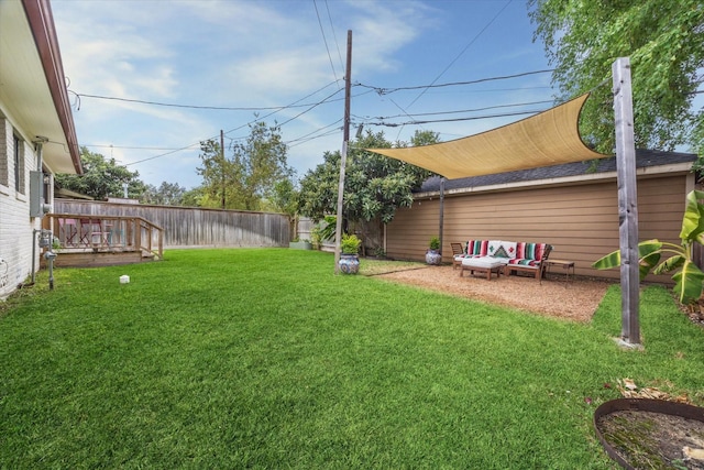 view of yard featuring a deck