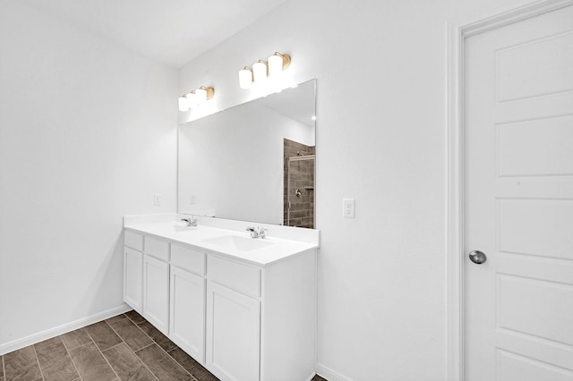 bathroom featuring vanity and walk in shower