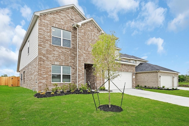 view of front facade with a front yard and a garage