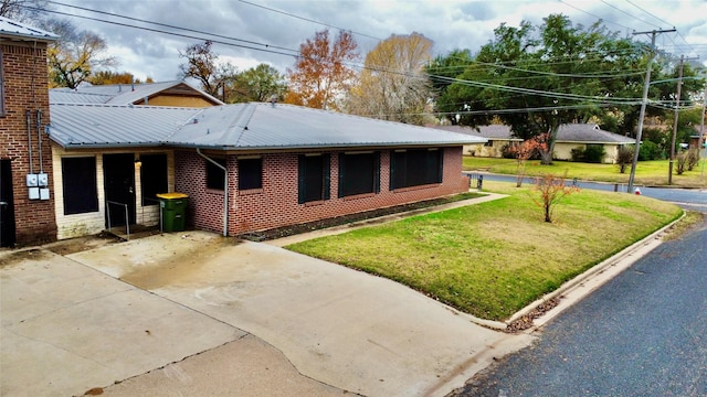 view of front of home with a front yard