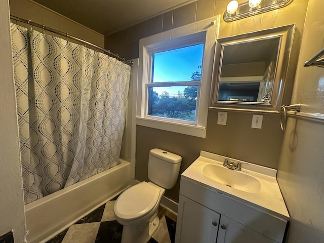 full bathroom featuring vanity, shower / bath combination with curtain, and toilet