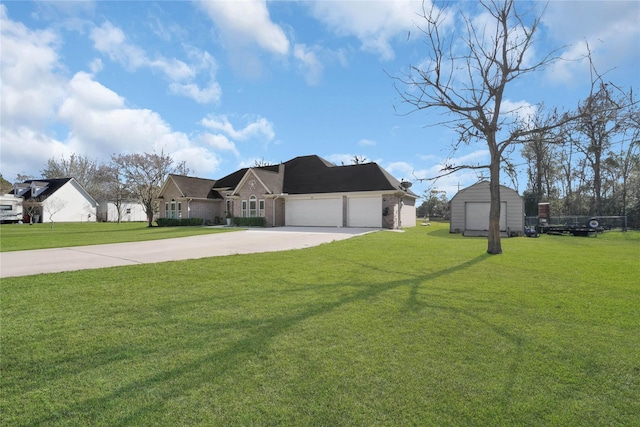 view of front of property featuring a front lawn and a garage