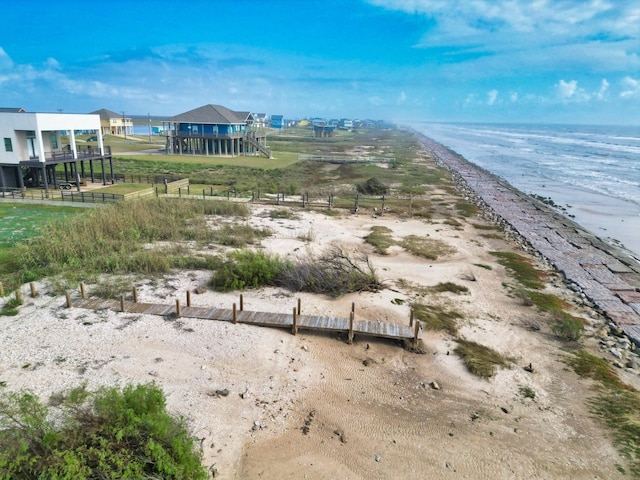 aerial view with a view of the beach and a water view