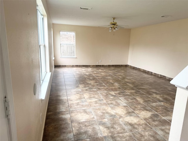 empty room with ceiling fan