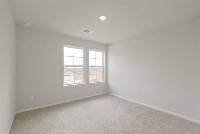 view of carpeted spare room