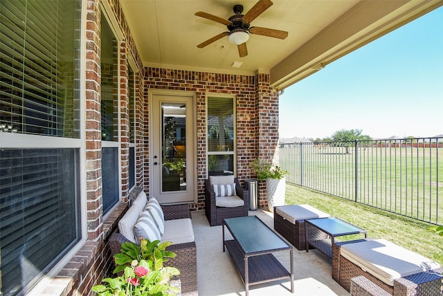 view of patio with outdoor lounge area and ceiling fan