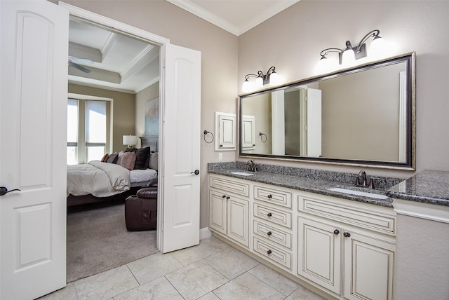 bathroom featuring vanity and ornamental molding