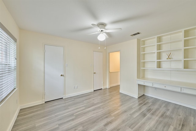 unfurnished bedroom featuring ceiling fan and light hardwood / wood-style flooring