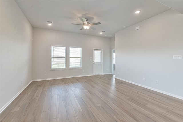 unfurnished room featuring ceiling fan and light hardwood / wood-style floors